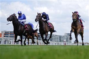 NEWBURY, ENGLAND - MAY 20: Frankie Dettori riding Haskoy (R, pink cap) win The Al Rayyan Stakes at Newbury Racecourse on May 20, 2023 in Newbury, England. (Photo by Alan Crowhurst/Getty Images)