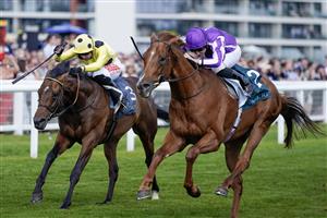 NEWBURY, ENGLAND - MAY 20: Ryan Moore riding Bertinelli (purple) win The BetVictor London Gold Cup Heritage Handicap at Newbury Racecourse on May 20, 2023 in Newbury, England. (Photo by Alan Crowhurst/Getty Images)