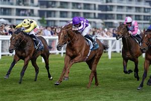 NEWBURY, ENGLAND - MAY 20: Ryan Moore riding Bertinelli (purple) win The BetVictor London Gold Cup Heritage Handicap at Newbury Racecourse on May 20, 2023 in Newbury, England. (Photo by Alan Crowhurst/Getty Images)