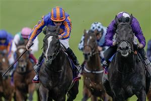 EPSOM, ENGLAND - JUNE 03: Ryan Moore riding Auguste Rodin (blue/orange) win The Betfred Derby from Rossa Ryan and King Of Steel (purple) on Derby Day at Epsom Racecourse on June 03, 2023 in Epsom, England. (Photo by Alan Crowhurst/Getty Images)