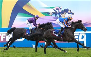 EPSOM, ENGLAND - JUNE 03: Auguste Rodin ridden by Ryan Moore (orange and blue silks) wins The Betfred Derby during Derby Day at Epsom Downs Racecourse on June 03, 2023 in Epsom, England. (Photo by Warren Little/Getty Images)