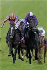 EPSOM, ENGLAND - JUNE 03: Ryan Moore riding Auguste Rodin (blue/orange) win The Betfred Derby from Rossa Ryan and King Of Steel (purple) on Derby Day at Epsom Racecourse on June 03, 2023 in Epsom, England. (Photo by Alan Crowhurst/Getty Images)