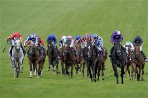 EPSOM, ENGLAND - JUNE 03: Ryan Moore riding Auguste Rodin (blue/orange) win The Betfred Derby from Rossa Ryan and King Of Steel (purple) on Derby Day at Epsom Racecourse on June 03, 2023 in Epsom, England. (Photo by Alan Crowhurst/Getty Images)
