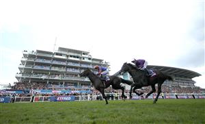 EPSOM, ENGLAND - JUNE 03: Auguste Rodin ridden by Ryan Moore (orange and blue silks) wins The Betfred Derby during Derby Day at Epsom Downs Racecourse on June 03, 2023 in Epsom, England. (Photo by Warren Little/Getty Images)