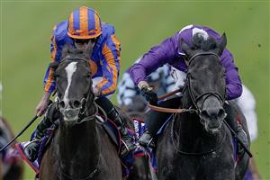 EPSOM, ENGLAND - JUNE 03: Ryan Moore riding Auguste Rodin (blue/orange) win The Betfred Derby from Rossa Ryan and King Of Steel (purple) on Derby Day at Epsom Racecourse on June 03, 2023 in Epsom, England. (Photo by Alan Crowhurst/Getty Images)