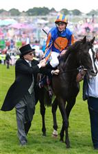 EPSOM, ENGLAND - JUNE 03: Auguste Rodin ridden by Ryan Moore wins The Betfred Derby during Derby Day at Epsom Downs Racecourse on June 03, 2023 in Epsom, England. (Photo by Warren Little/Getty Images)