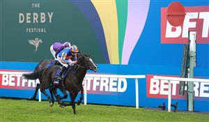 EPSOM, ENGLAND - JUNE 03: Auguste Rodin ridden by Ryan Moore wins The Betfred Derby during Derby Day at Epsom Downs Racecourse on June 03, 2023 in Epsom, England. (Photo by Warren Little/Getty Images)