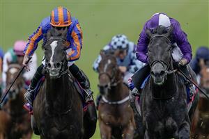 EPSOM, ENGLAND - JUNE 03: Ryan Moore riding Auguste Rodin (blue/orange) win The Betfred Derby from Rossa Ryan and King Of Steel (purple) on Derby Day at Epsom Racecourse on June 03, 2023 in Epsom, England. (Photo by Alan Crowhurst/Getty Images)