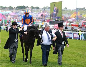 EPSOM, ENGLAND - JUNE 03: Auguste Rodin ridden by Ryan Moore wins The Betfred Derby during Derby Day at Epsom Downs Racecourse on June 03, 2023 in Epsom, England. (Photo by Warren Little/Getty Images)