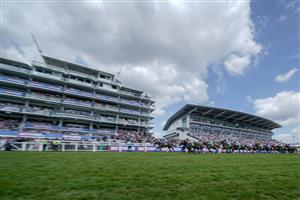 EPSOM, ENGLAND - JUNE 03: Connor Beasley riding Tatterstall (L, purple) win The Aston Martin 3YO 'Dash' Handicap on Derby Day at Epsom Racecourse on June 03, 2023 in Epsom, England. (Photo by Alan Crowhurst/Getty Images)