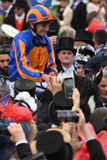 Jockey Ryan Moore returns to the winner's enclosure on Auguste Rodin after winning the Derby on the second day of the Epsom Derby Festival horse racing event in Surrey, southern England on June 3, 2023. (Photo by Ben Stansall / AFP) (Photo by BEN STANSALL/AFP via Getty Images)