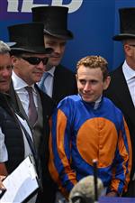 Jockey Ryan Moore (R) and trainer Aidan O'Brien (L) at the presentation after Auguste Rodin wins the Derby on the second day of the Epsom Derby Festival horse racing event in Surrey, southern England on June 3, 2023. (Photo by Ben Stansall / AFP) (Photo by BEN STANSALL/AFP via Getty Images)