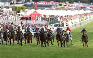 EPSOM, ENGLAND - JUNE 03: Navallo ridden by Andrea Atzeni (purple silks) wins the The Aston Martin Dash Handicap Stakes is run during Derby Day at Epsom Downs Racecourse on June 03, 2023 in Epsom, England. (Photo by Warren Little/Getty Images)