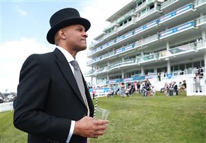 EPSOM, ENGLAND - JUNE 03: Race goers are pictured during Derby Day at Epsom Downs Racecourse on June 03, 2023 in Epsom, England. (Photo by Warren Little/Getty Images)
