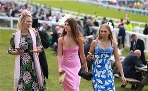 EPSOM, ENGLAND - JUNE 03: Race goers are pictured during Derby Day at Epsom Downs Racecourse on June 03, 2023 in Epsom, England. (Photo by Warren Little/Getty Images)