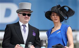 EPSOM, ENGLAND - JUNE 03: Race goers are pictured during Derby Day at Epsom Downs Racecourse on June 03, 2023 in Epsom, England. (Photo by Warren Little/Getty Images)