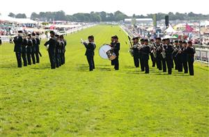 EPSOM, ENGLAND - JUNE 03: The band plays during Derby Day at Epsom Downs Racecourse on June 03, 2023 in Epsom, England. (Photo by Warren Little/Getty Images)