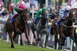 EPSOM, ENGLAND - JUNE 03: Frankie Dettori riding Prosperous Voyage (pink/green) win The Princess Elizabeth Stakes on Derby Day at Epsom Racecourse on June 03, 2023 in Epsom, England. (Photo by Alan Crowhurst/Getty Images)