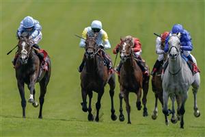 EPSOM, ENGLAND - JUNE 03: Ryan Moore riding Regal Reality (L, light blue) win The Betfred Diomed Stakes on Derby Day at Epsom Racecourse on June 03, 2023 in Epsom, England. (Photo by Alan Crowhurst/Getty Images)