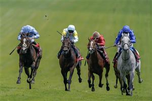 EPSOM, ENGLAND - JUNE 03: Ryan Moore riding Regal Reality (L, light blue) win The Betfred Diomed Stakes on Derby Day at Epsom Racecourse on June 03, 2023 in Epsom, England. (Photo by Alan Crowhurst/Getty Images)
