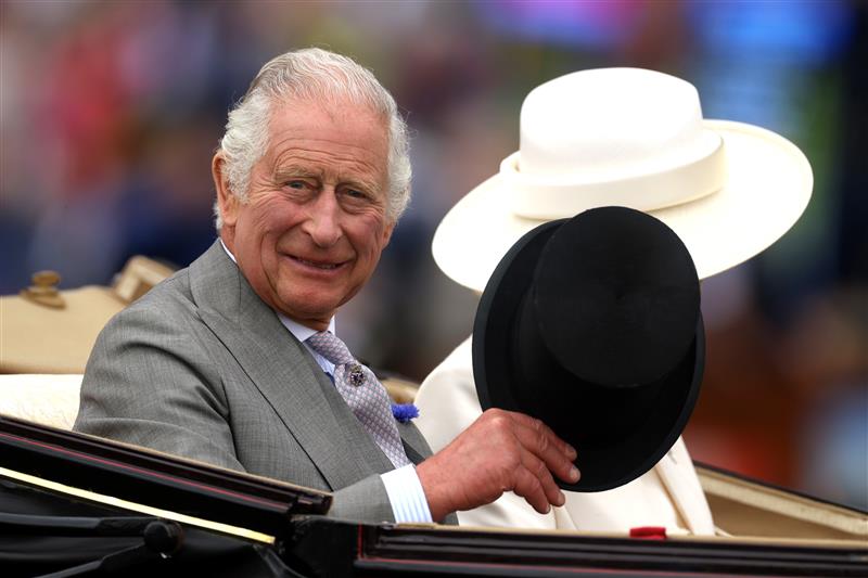 ASCOT, ENGLAND - JUNE 20: King Charles III arrives in The Royal Procession prior to Royal Ascot 2023 at Ascot Racecourse on June 20, 2023 in Ascot, England. (Photo by Alex Pantling/Getty Images)