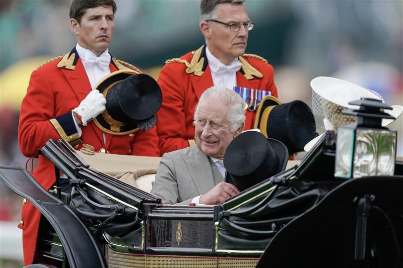 ASCOT, ENGLAND - JUNE 20: King Charles III travels down the course on day one during Royal Ascot 2023 at Ascot Racecourse on June 20, 2023 in Ascot, England. (Photo by Alan Crowhurst/Getty Images for Ascot Racecourse)