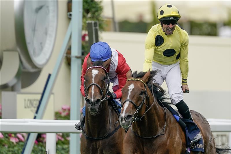ASCOT, ENGLAND - JUNE 20: Neil Callan celebrates as he rides Triple Time to win The Queen Anne Stakes on day one during Royal Ascot 2023 at Ascot Racecourse on June 20, 2023 in Ascot, England. (Photo by Alan Crowhurst/Getty Images for Ascot Racecourse)