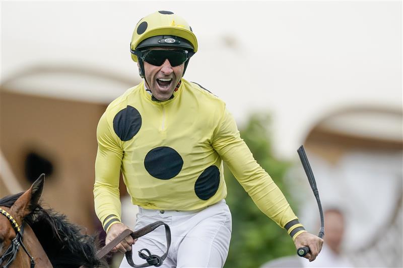 ASCOT, ENGLAND - JUNE 20: Neil Callan celebrates as he rides Triple Time to win The Queen Anne Stakes on day one during Royal Ascot 2023 at Ascot Racecourse on June 20, 2023 in Ascot, England. (Photo by Alan Crowhurst/Getty Images for Ascot Racecourse)