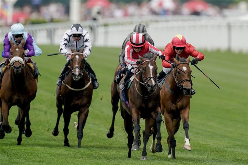 ASCOT, ENGLAND - JUNE 20: Hollie Doyle riding Bradsell (red/white cap) win The King's Stand Stakes on day one during Royal Ascot 2023 at Ascot Racecourse on June 20, 2023 in Ascot, England. (Photo by Alan Crowhurst/Getty Images for Ascot Racecourse)