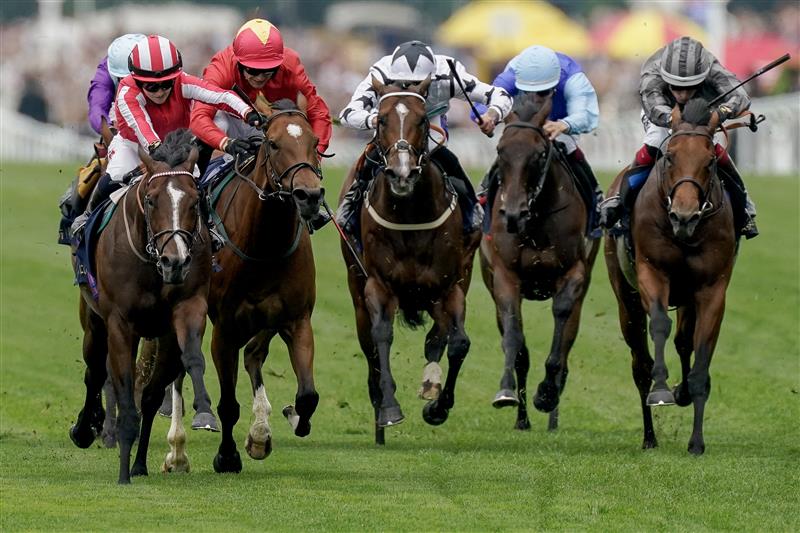 ASCOT, ENGLAND - JUNE 20: Hollie Doyle riding Bradsell (red/white cap) win The King's Stand Stakes on day one during Royal Ascot 2023 at Ascot Racecourse on June 20, 2023 in Ascot, England. (Photo by Alan Crowhurst/Getty Images for Ascot Racecourse)