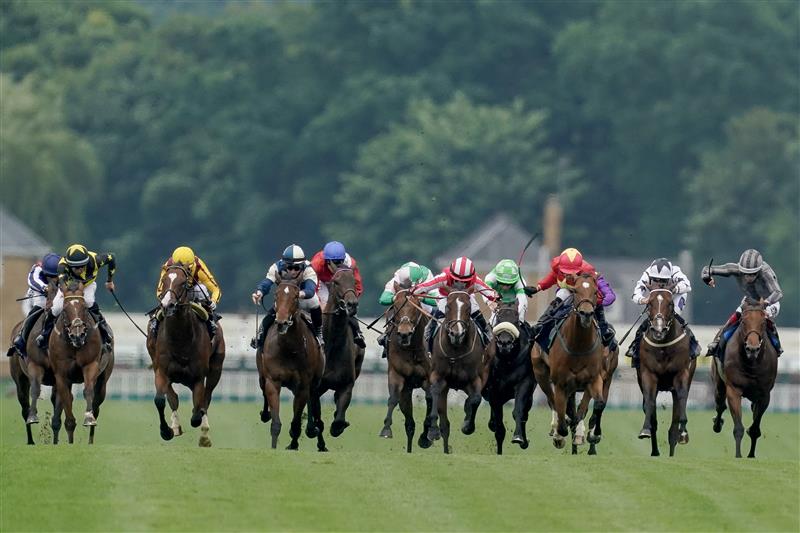 ASCOT, ENGLAND - JUNE 20: Hollie Doyle riding Bradsell (red/white cap) win The King's Stand Stakes on day one during Royal Ascot 2023 at Ascot Racecourse on June 20, 2023 in Ascot, England. (Photo by Alan Crowhurst/Getty Images for Ascot Racecourse)