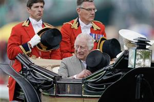 ASCOT, ENGLAND - JUNE 20: King Charles III travels down the course on day one during Royal Ascot 2023 at Ascot Racecourse on June 20, 2023 in Ascot, England. (Photo by Alan Crowhurst/Getty Images for Ascot Racecourse)