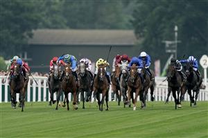 ASCOT, ENGLAND - JUNE 20: Neil Callan riding Triple Time (yellow) win The Queen Anne Stakes on day one during Royal Ascot 2023 at Ascot Racecourse on June 20, 2023 in Ascot, England. (Photo by Alan Crowhurst/Getty Images for Ascot Racecourse)