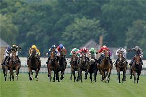 ASCOT, ENGLAND - JUNE 20: Hollie Doyle riding Bradsell (red/white cap) win The King's Stand Stakes on day one during Royal Ascot 2023 at Ascot Racecourse on June 20, 2023 in Ascot, England. (Photo by Alan Crowhurst/Getty Images for Ascot Racecourse)