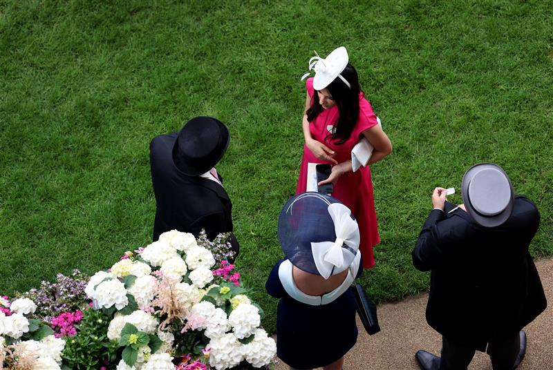 ASCOT, ENGLAND - JUNE 21: Racegoers are seen on day two during Royal Ascot 2023 at Ascot Racecourse on June 21, 2023 in Ascot, England. (Photo by Tom Dulat/Getty Images for Ascot Racecourse)