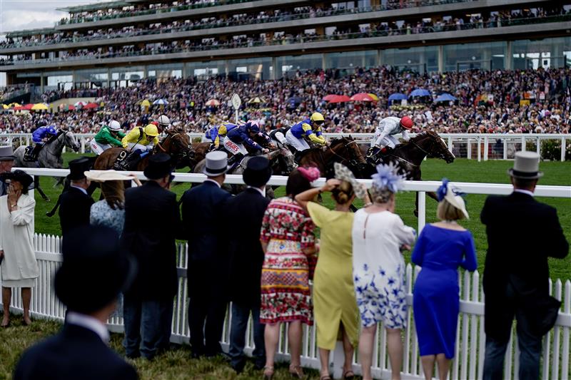ASCOT, ENGLAND - JUNE 21: Colin Keane riding Villanova Queen (R, red cap) win The Kensington Palace Fillies' Handicap on day two during Royal Ascot 2023 at Ascot Racecourse on June 21, 2023 in Ascot, England. (Photo by Alan Crowhurst/Getty Images for Ascot Racecourse)