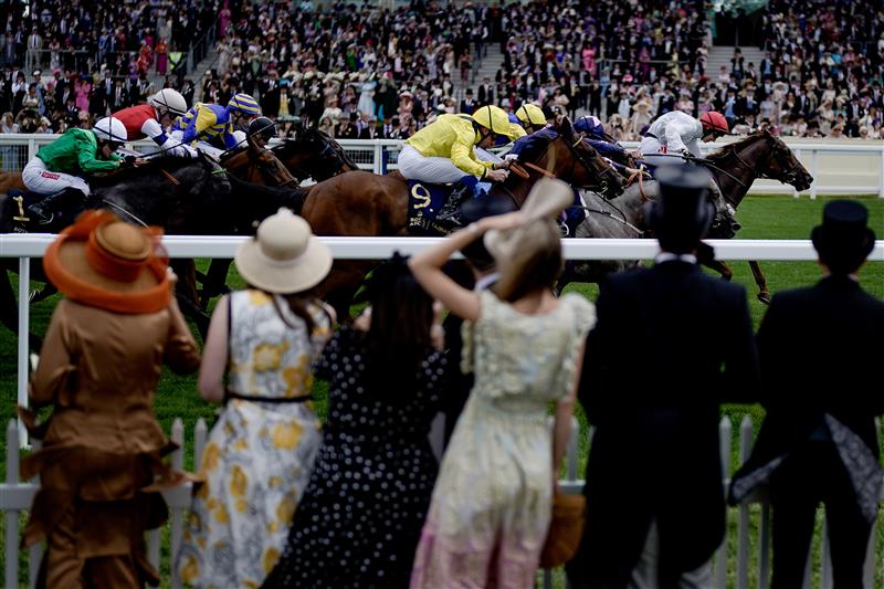 ASCOT, ENGLAND - JUNE 21: Colin Keane riding Villanova Queen (R, red cap) win The Kensington Palace Fillies' Handicap on day two during Royal Ascot 2023 at Ascot Racecourse on June 21, 2023 in Ascot, England. (Photo by Alan Crowhurst/Getty Images for Ascot Racecourse)