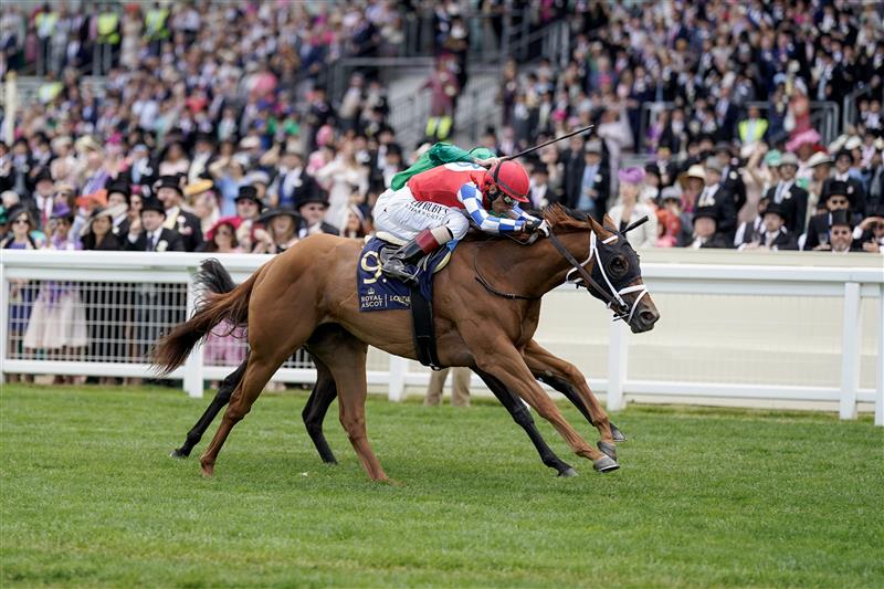 ASCOT, ENGLAND - JUNE 21: John Velazquez riding Crimson Advocate (red) win The Queen Mary Stakes on day two during Royal Ascot 2023 at Ascot Racecourse on June 21, 2023 in Ascot, England. (Photo by Alan Crowhurst/Getty Images for Ascot Racecourse)