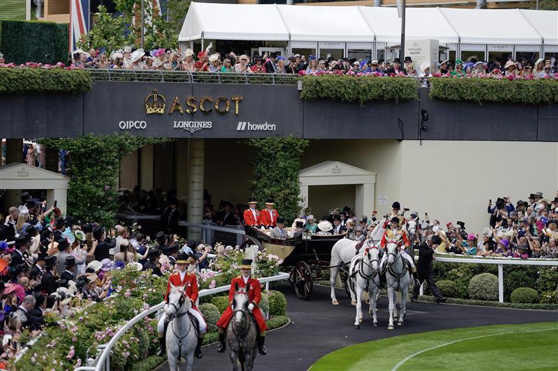 ASCOT, ENGLAND - JUNE 21: King Chrles III and Queen Camilla arrive in the parade ring on day two during Royal Ascot 2023 at Ascot Racecourse on June 21, 2023 in Ascot, England. (Photo by Alan Crowhurst/Getty Images for Ascot Racecourse)