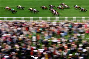 ASCOT, ENGLAND - JUNE 21: A general view as runners and riders compete in the Queen Mary's Stakes during day two of Royal Ascot 2023 at Ascot Racecourse on June 21, 2023 in Ascot, England. (Photo by Alex Pantling/Getty Images)