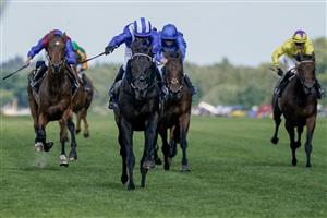ASCOT, ENGLAND - JUNE 21: Jim Crowley riding Mostahdaf (blue/white) win The Prince Of Wales's Stakes on day two during Royal Ascot 2023 at Ascot Racecourse on June 21, 2023 in Ascot, England. (Photo by Alan Crowhurst/Getty Images for Ascot Racecourse)