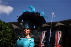 ASCOT, ENGLAND - JUNE 21: A racegoer poses for a photo during day two of Royal Ascot 2023 at Ascot Racecourse on June 21, 2023 in Ascot, England. (Photo by Alex Pantling/Getty Images)