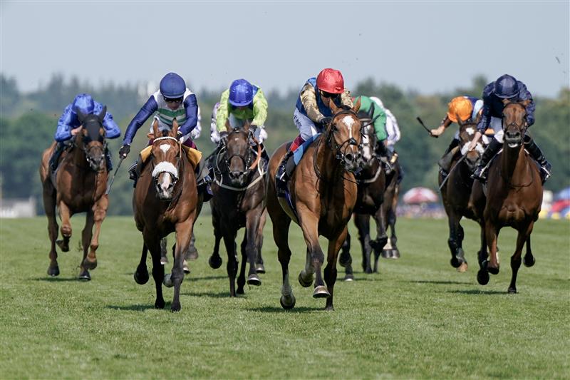 ASCOT, ENGLAND - JUNE 22: Frankie Dettori riding Courage Mon Ami (red cap) win The Gold Cup on day three during Royal Ascot 2023 at Ascot Racecourse on June 22, 2023 in Ascot, England. (Photo by Alan Crowhurst/Getty Images for Ascot Racecourse)