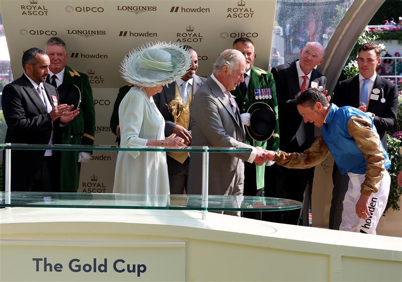 ASCOT, ENGLAND - JUNE 22: King Charles III congratulates Frankie Dettori after riding Courage Mon Ami to winning The Gold Cup on day three during Royal Ascot 2023 at Ascot Racecourse on June 22, 2023 in Ascot, England. (Photo by Tom Dulat/Getty Images for Ascot Racecourse)