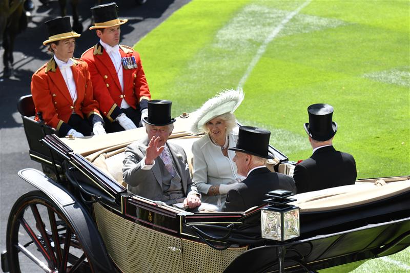 ASCOT, ENGLAND - JUNE 22: King Charles III and Queen Camilla attend day three of Royal Ascot 2023 at Ascot Racecourse on June 22, 2023 in Ascot, England. (Photo by Kirstin Sinclair/Getty Images for Royal Ascot)