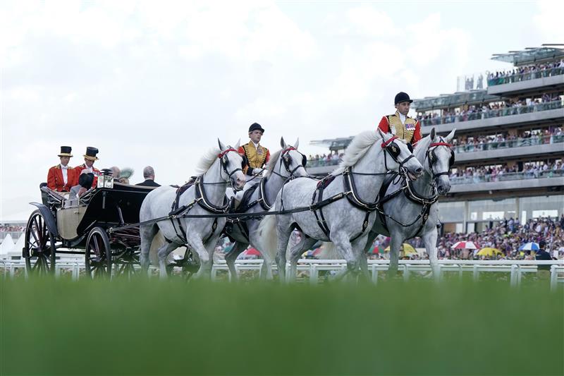 ASCOT, ENGLAND - JUNE 22: The royal procession make their way down the course on day three during Royal Ascot 2023 at Ascot Racecourse on June 22, 2023 in Ascot, England. (Photo by Alan Crowhurst/Getty Images for Ascot Racecourse)