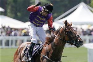 ASCOT, ENGLAND - JUNE 22: Tom Marquand celebrates after riding Desert Hero to win The King George V Stakes on day three during Royal Ascot 2023 at Ascot Racecourse on June 22, 2023 in Ascot, England. (Photo by Alan Crowhurst/Getty Images for Ascot Racecourse)