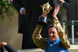 Jockey Frankie Dettori celebrates with the Gold Cup trophy after his victory on Courage Mon Ami in the Ascot Gold Cup on the third day of the Royal Ascot horse racing meeting in Ascot, west of London, on June 22, 2023. (Photo by JUSTIN TALLIS / AFP) (Photo by JUSTIN TALLIS/AFP via Getty Images)