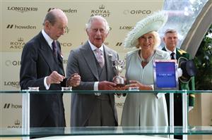 ASCOT, ENGLAND - JUNE 22: Owners of Desert Hero, King Charles III and Queen Camilla collect the winners trophy for The King George V Stakes during day three of Royal Ascot 2023 at Ascot Racecourse on June 22, 2023 in Ascot, England. (Photo by Alex Pantling/Getty Images)