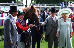 ASCOT, ENGLAND - JUNE 22: Desert Hero ridden by Tom Marquand with owners HM the King and HM The Queen after The King George V Stakes during day three of Royal Ascot 2023 at Ascot Racecourse on June 22, 2023 in Ascot, England. (Photo by Alex Pantling/Getty Images)